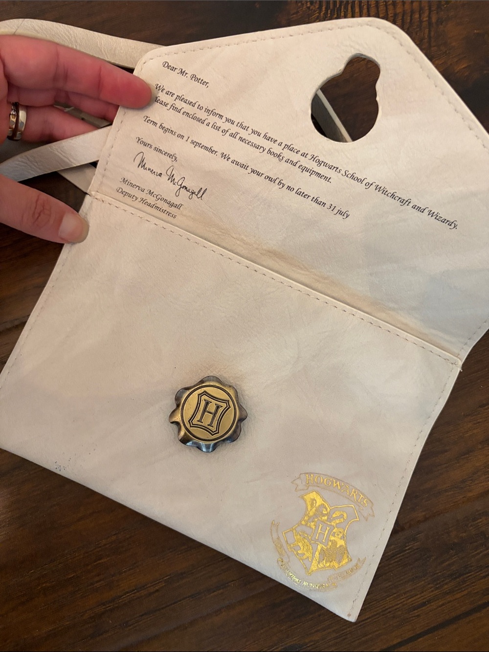 Warner Bros. White Hogwarts Crest Envelope Clutch